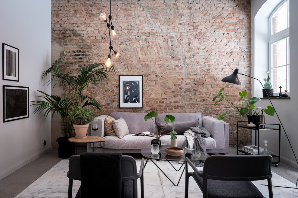 Mittelgroßes, Abgetrenntes, Repräsentatives Skandinavisches Wohnzimmer mit grauem Boden, weißer Wandfarbe und Betonboden in Göteborg