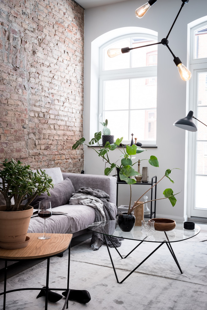 Immagine di un soggiorno scandinavo chiuso con moquette