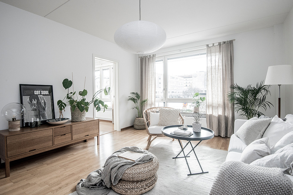 This is an example of a scandi living room in Stockholm with feature lighting.