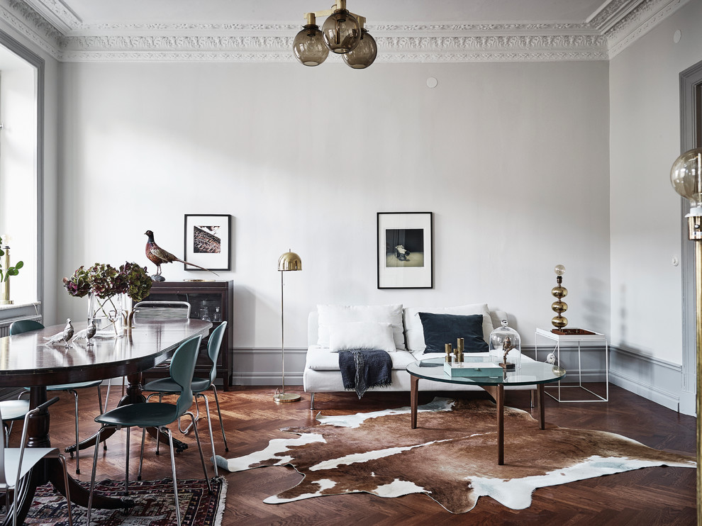 Inspiration for a mid-sized victorian formal dark wood floor living room remodel in Gothenburg with white walls and no tv