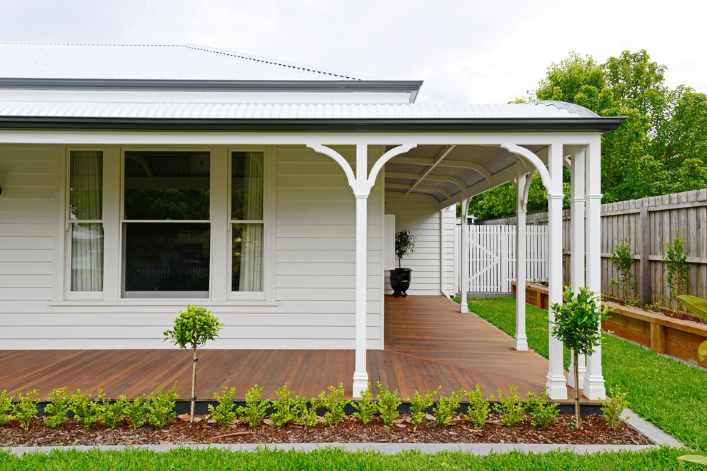 Inspiration for a large victorian front veranda in Geelong with decking.
