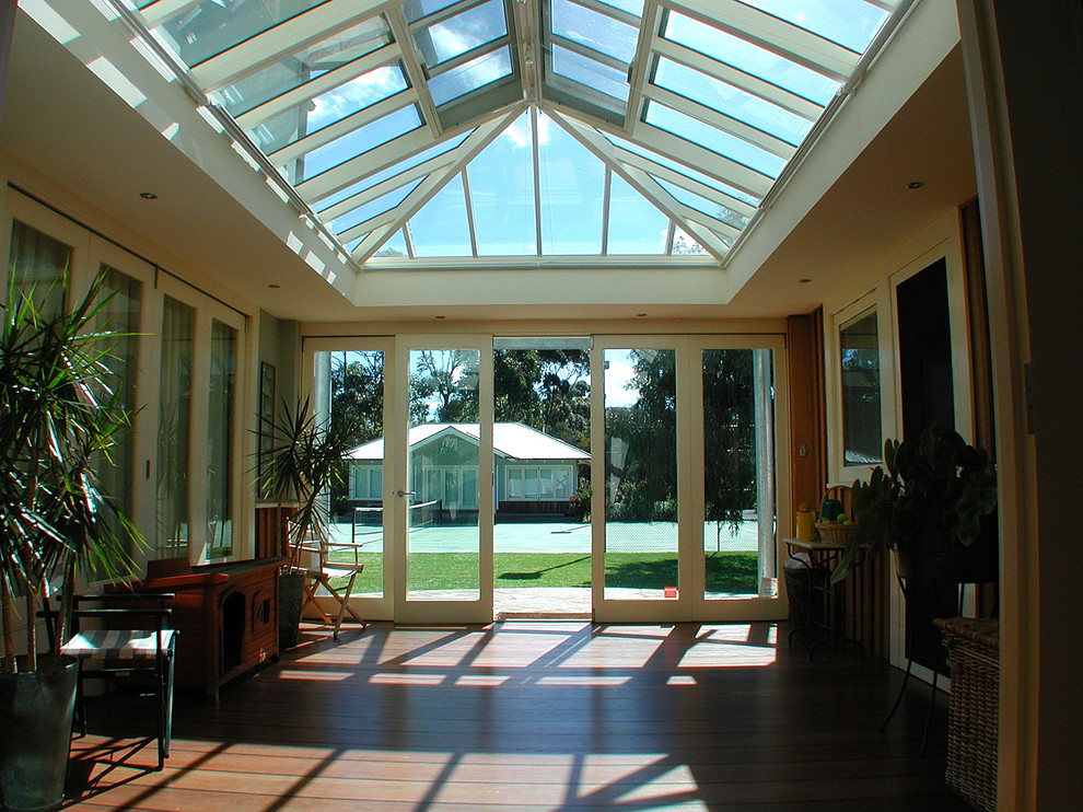 Photo of a contemporary conservatory in Melbourne.