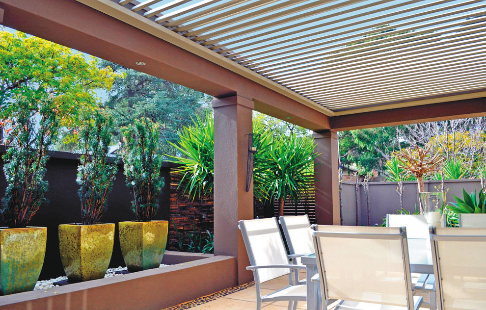 Inspiration for a contemporary back veranda in Adelaide with a pergola.