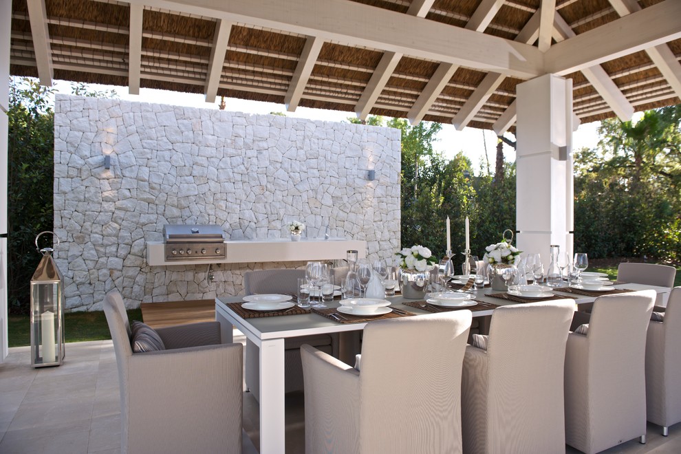 Example of a tuscan patio design in Other