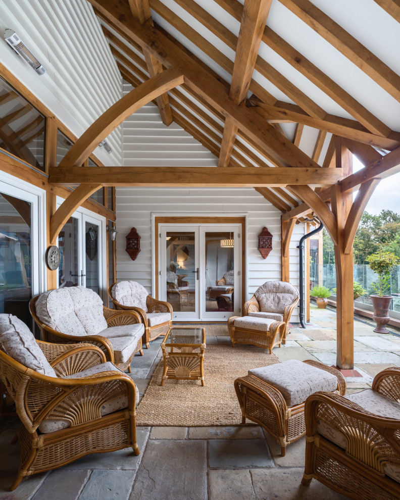 This is an example of a farmhouse veranda in Other.