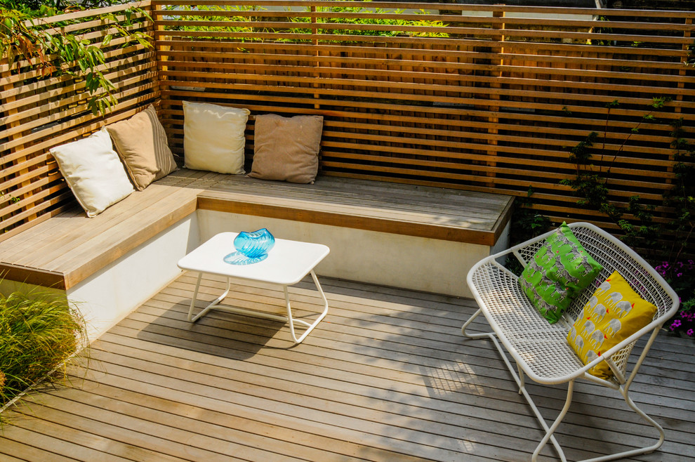 This is an example of a small contemporary veranda in London.