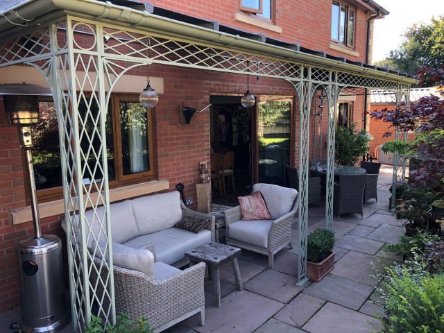 Treillage Veranda with partially glazed roof Traditional