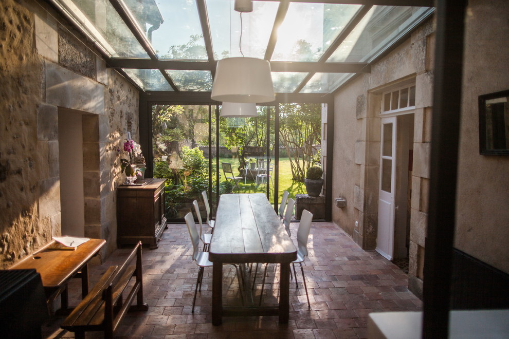 Design ideas for a country conservatory in Other with a glass ceiling.
