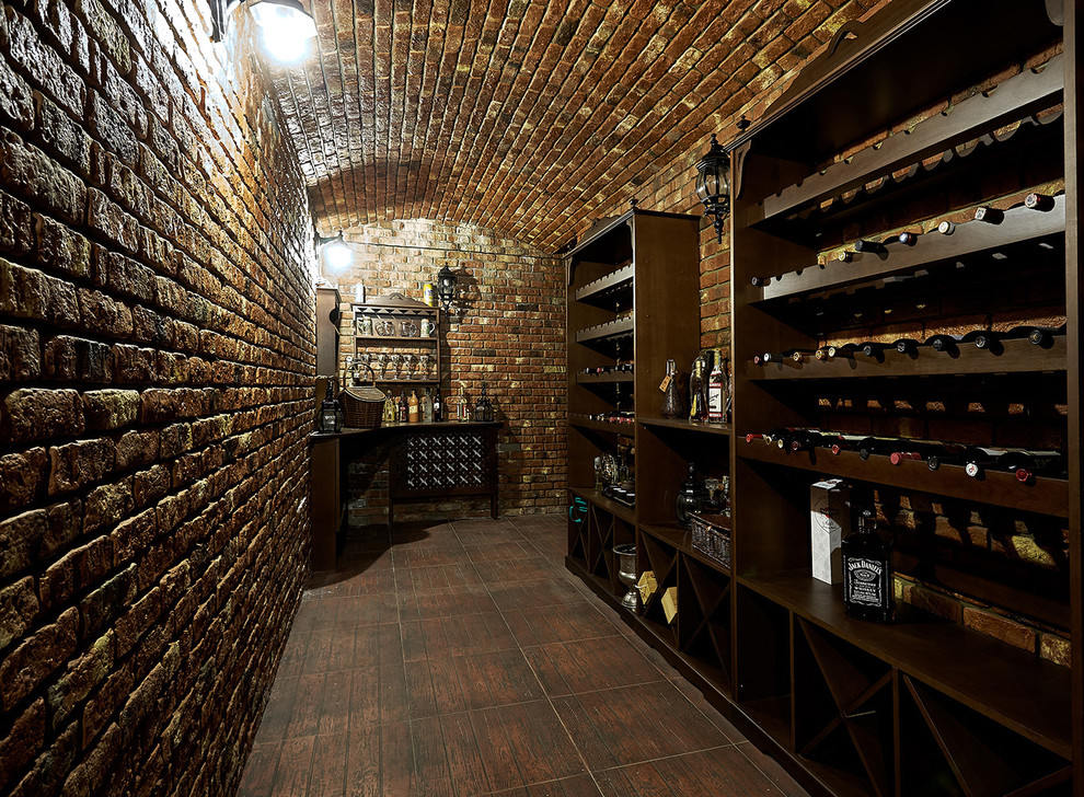 Classic wine cellar in Other with storage racks.