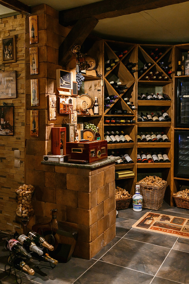 Design ideas for a small rustic wine cellar in Other with display racks.