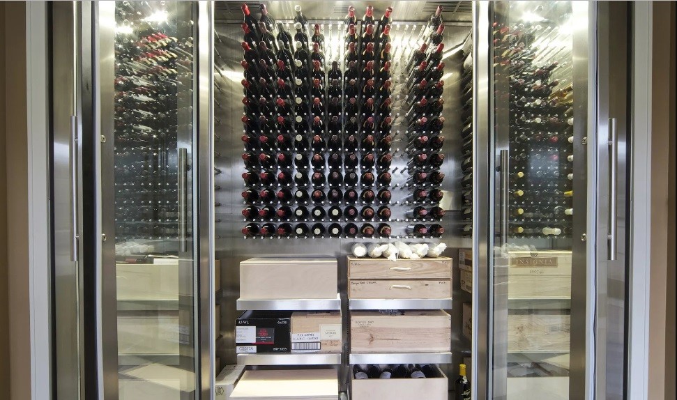 Photo of a medium sized traditional wine cellar in Moscow with porcelain flooring, storage racks and multi-coloured floors.
