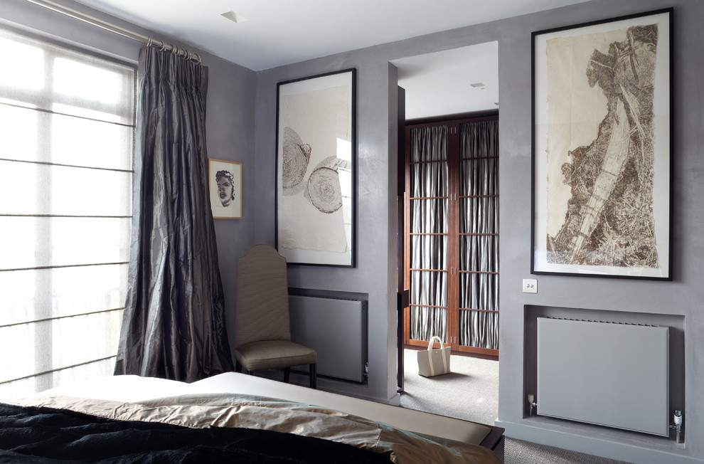 This is an example of a small contemporary bedroom in London.