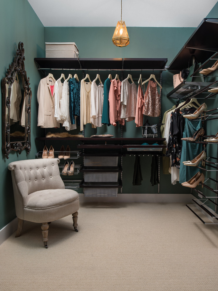 Mid-sized transitional women's carpeted and beige floor walk-in closet photo in Other with open cabinets and black cabinets
