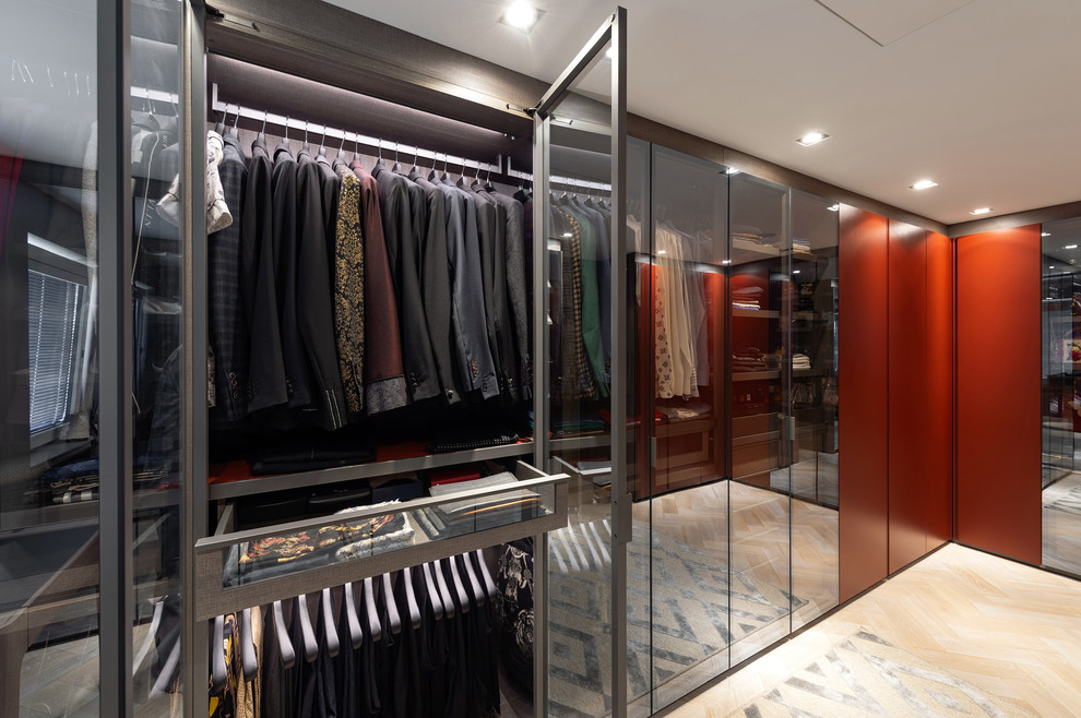 This is an example of a contemporary wardrobe in Surrey.
