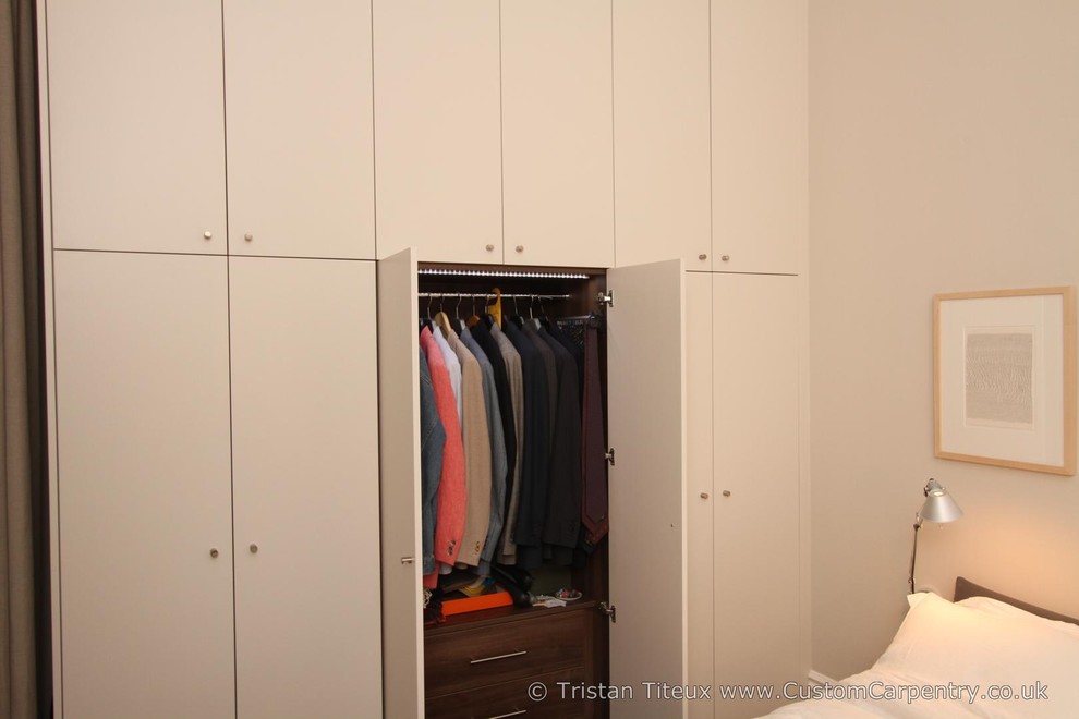 Tall white wardrobe with Walnut interior Contemporary Wardrobe