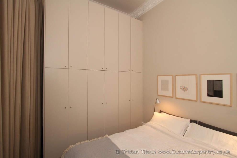 This is an example of a large contemporary wardrobe in London.