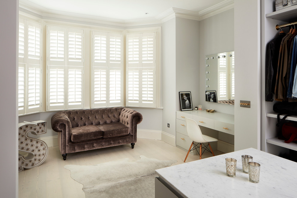 Large contemporary gender neutral dressing room in London.