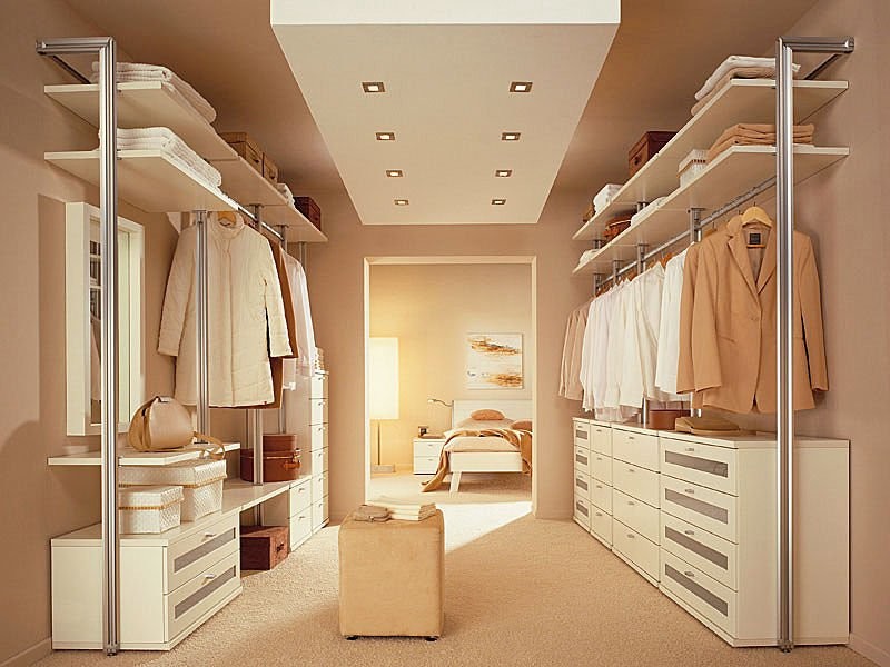Example of a mid-sized trendy porcelain tile closet design in Other