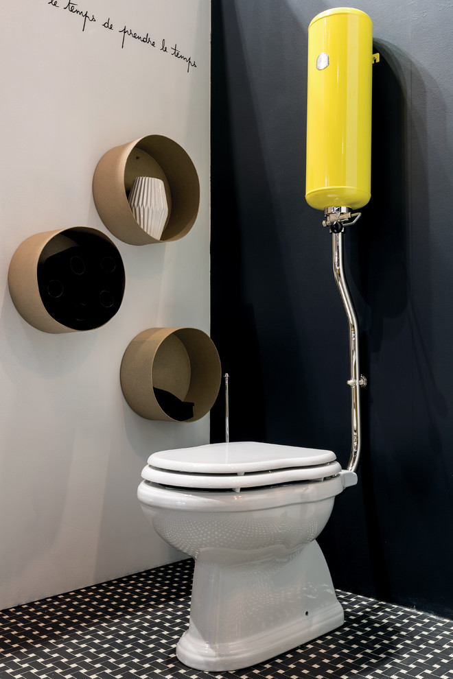 Immagine di un bagno di servizio minimalista con WC a due pezzi