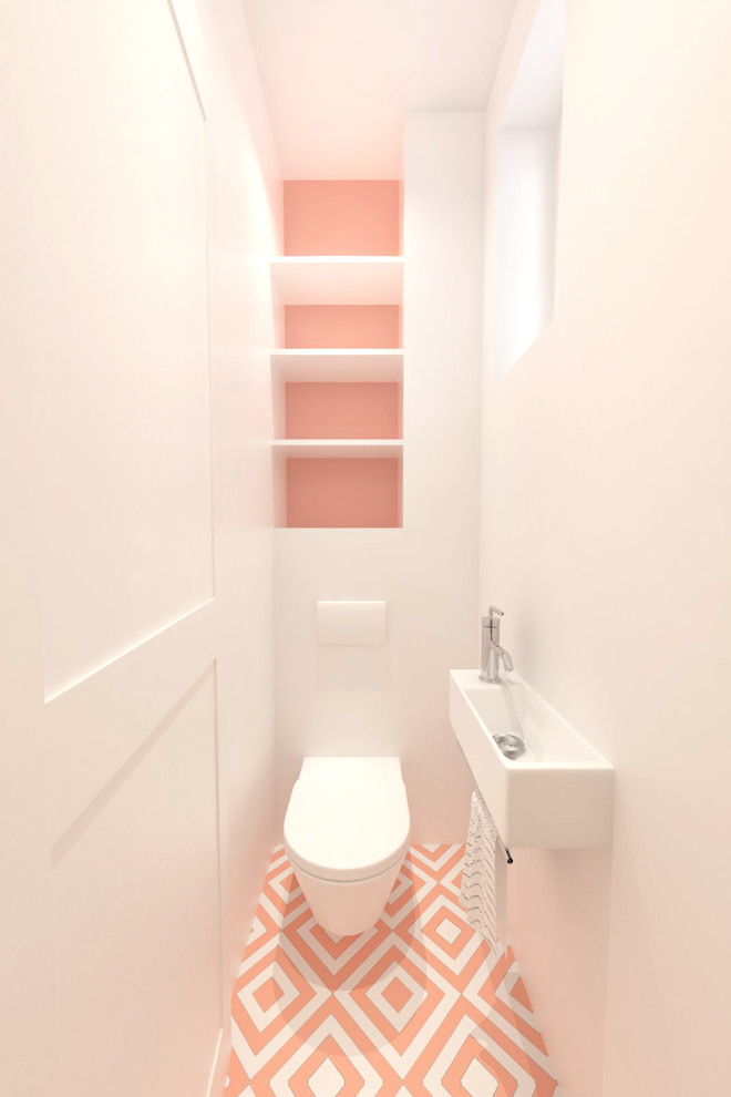 Идея дизайна: маленький туалет в стиле модернизм с инсталляцией, белыми стенами, полом из цементной плитки, подвесной раковиной и разноцветным полом для на участке и в саду