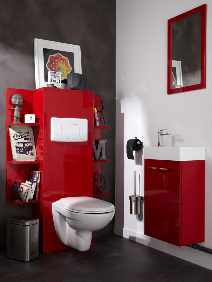Inspiration for a medium sized modern cloakroom in Lille with a wall mounted toilet and grey walls.