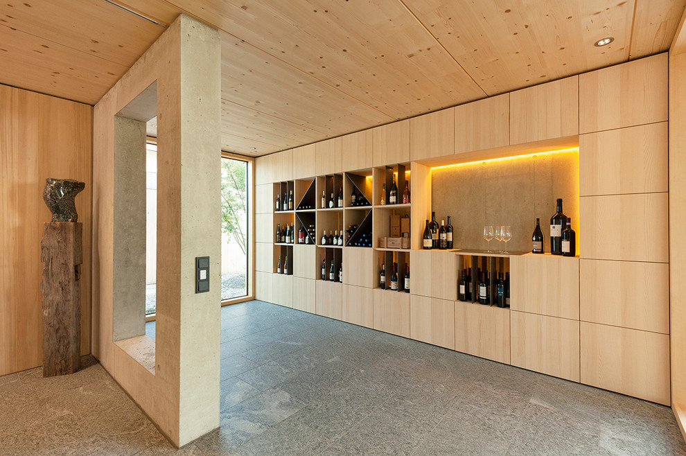 Large scandi wine cellar in Other with display racks.