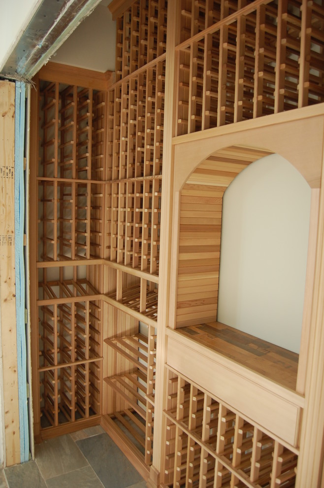 Wine cellar - traditional wine cellar idea in Miami