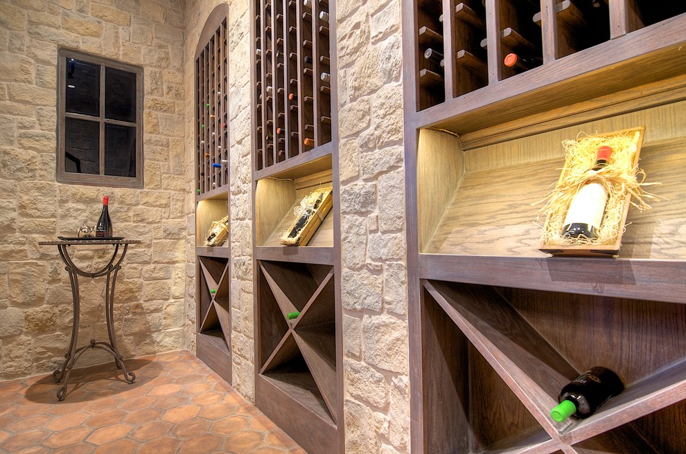 Example of a large classic wine cellar design in Dallas with storage racks