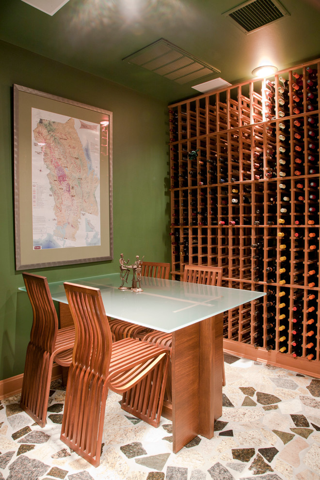 Contemporary wine cellar in New Orleans with storage racks.