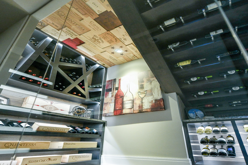 Mid-sized trendy vinyl floor and beige floor wine cellar photo in Cleveland with display racks