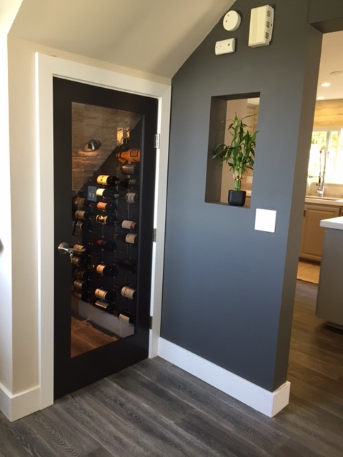 Design ideas for a medium sized traditional wine cellar in Orange County with storage racks.