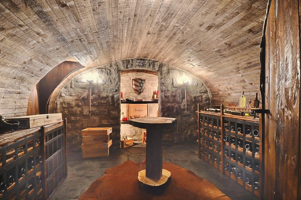 Wine cellar - mediterranean wine cellar idea in Montreal