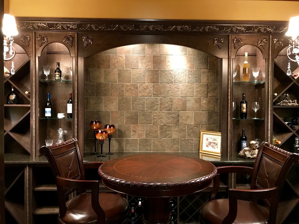 Photo of a medium sized classic wine cellar in New York with cube storage.