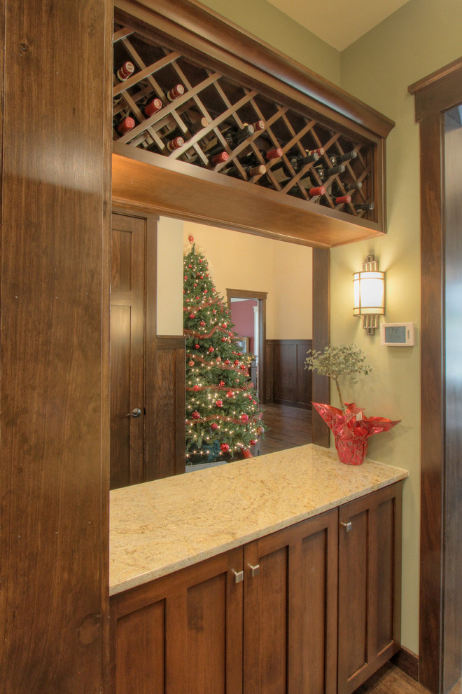 Example of an arts and crafts dark wood floor wine cellar design in Atlanta