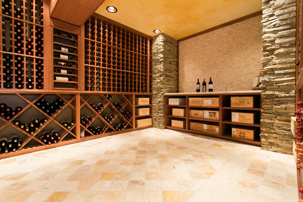 Photo of a large traditional wine cellar in New York with marble flooring and storage racks.