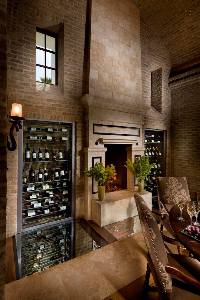 Mediterranean wine cellar in Orange County with display racks.