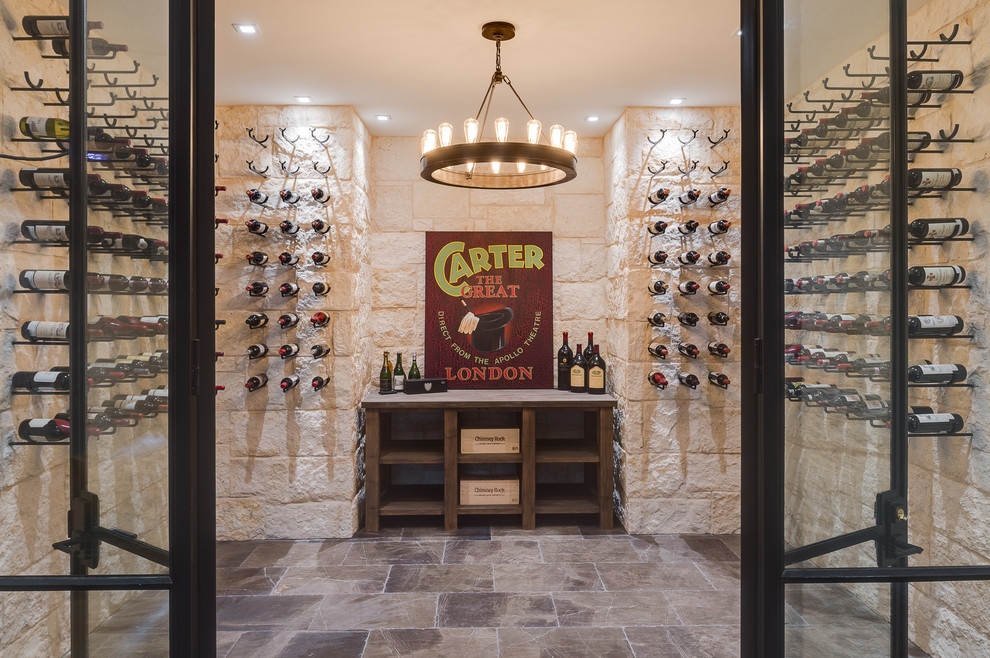 Inspiration for a traditional wine cellar in Atlanta with storage racks and grey floors.