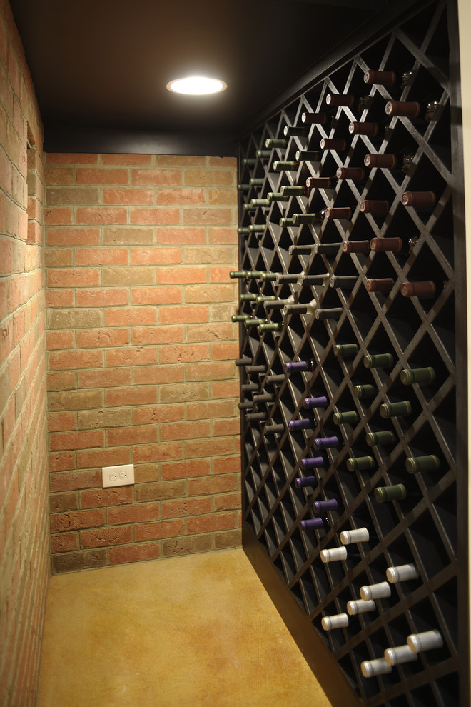 Elegant wine cellar photo in Columbus with diamond bins