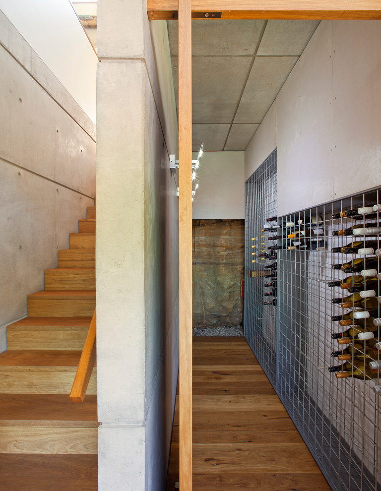 Photo of a contemporary wine cellar in Sydney.