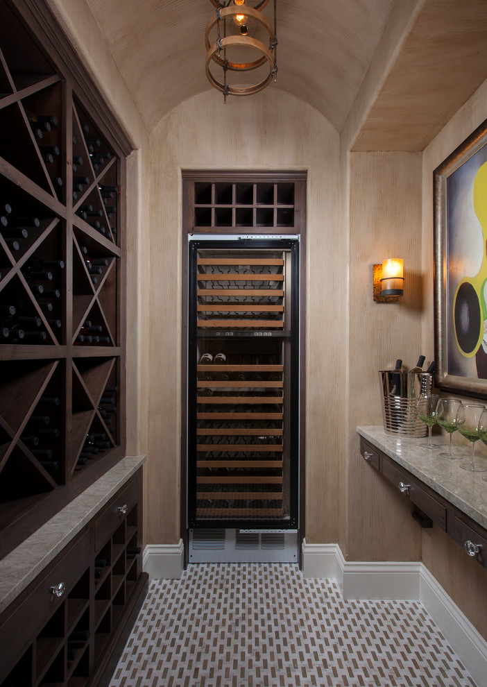 Photo of a world-inspired wine cellar in Miami with cube storage.
