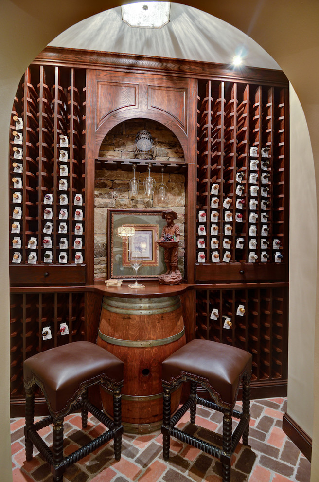 Elegant brick floor wine cellar photo in Atlanta