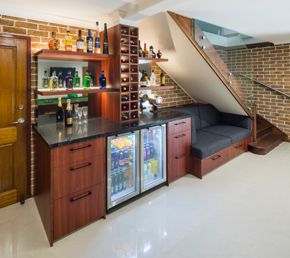 Wine cellar - modern wine cellar idea in Sydney with display racks