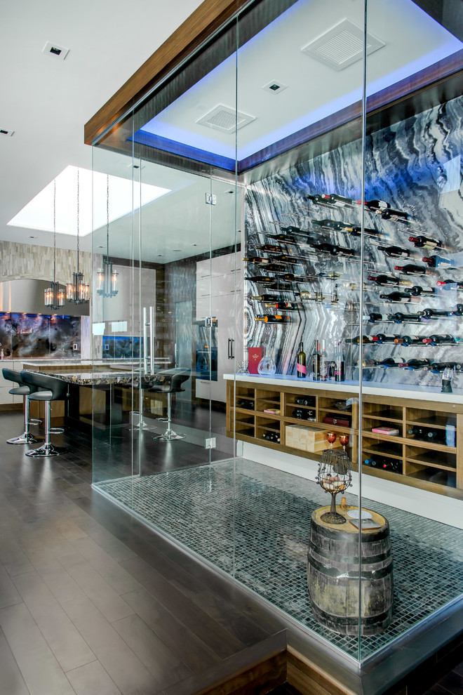 Wine cellar - large contemporary ceramic tile wine cellar idea in Edmonton with display racks