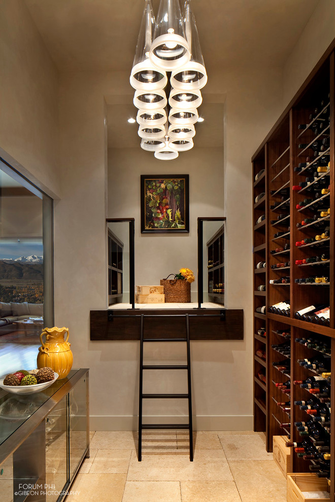 This is an example of a rustic wine cellar in Denver.