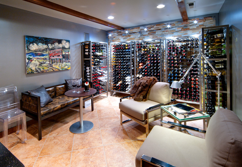 Photo of a medium sized contemporary wine cellar in Other with ceramic flooring, storage racks and orange floors.