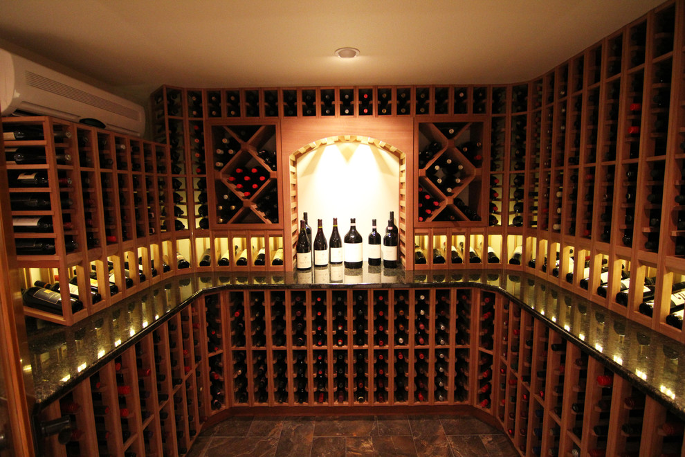 Inspiration for a rustic wine cellar in Denver.