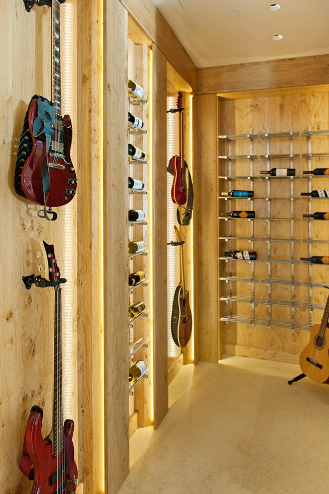 This is an example of a medium sized traditional wine cellar in San Francisco with porcelain flooring and storage racks.