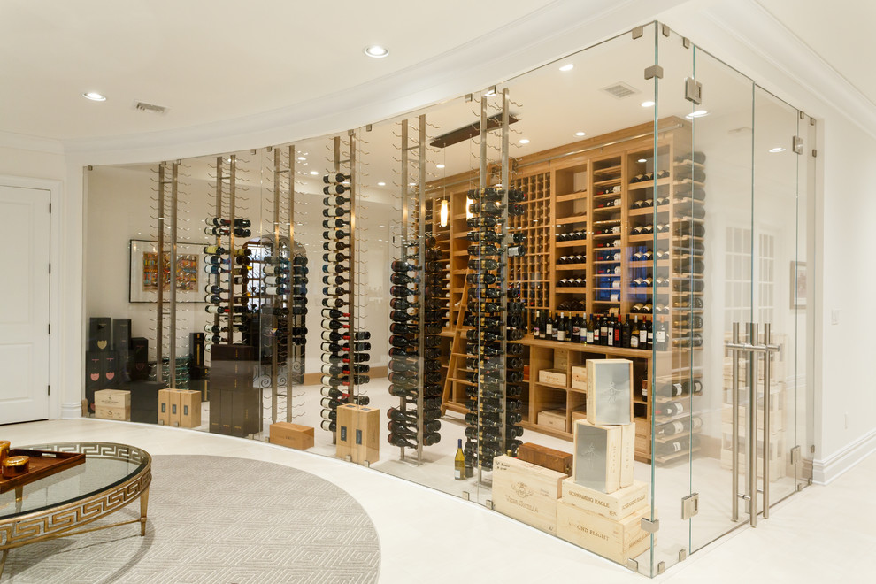 Expansive contemporary wine cellar in New York with marble flooring, storage racks and white floors.