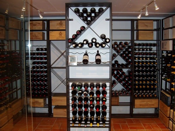 Inspiration for a timeless wine cellar remodel in London