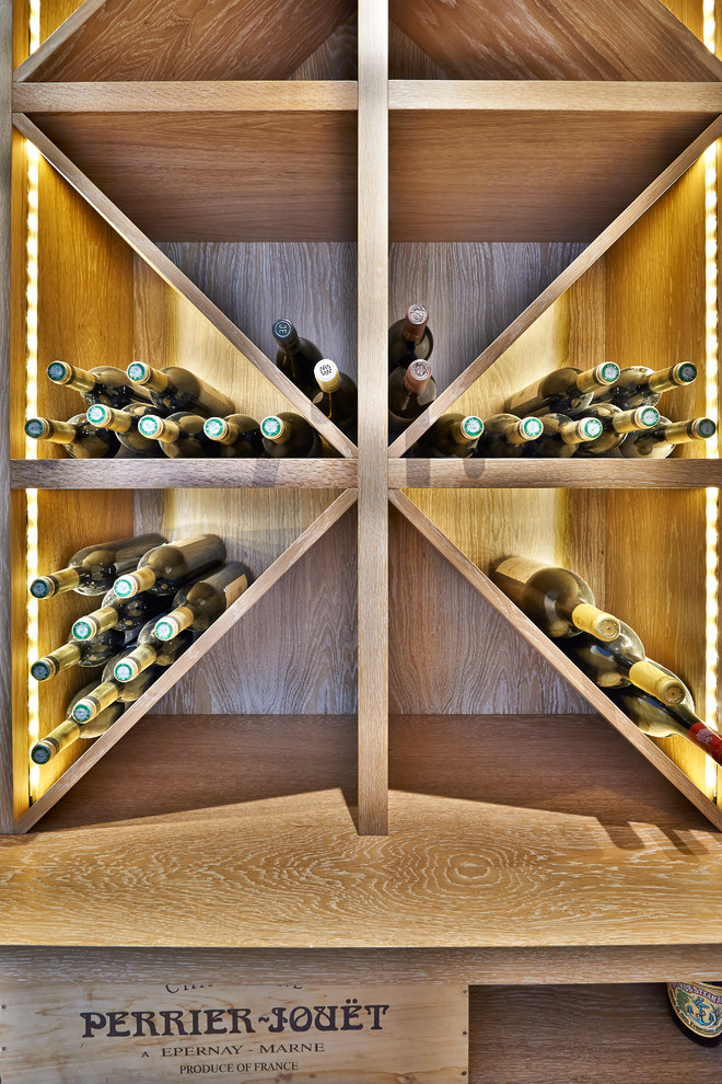Wine cellar - contemporary wine cellar idea in Surrey